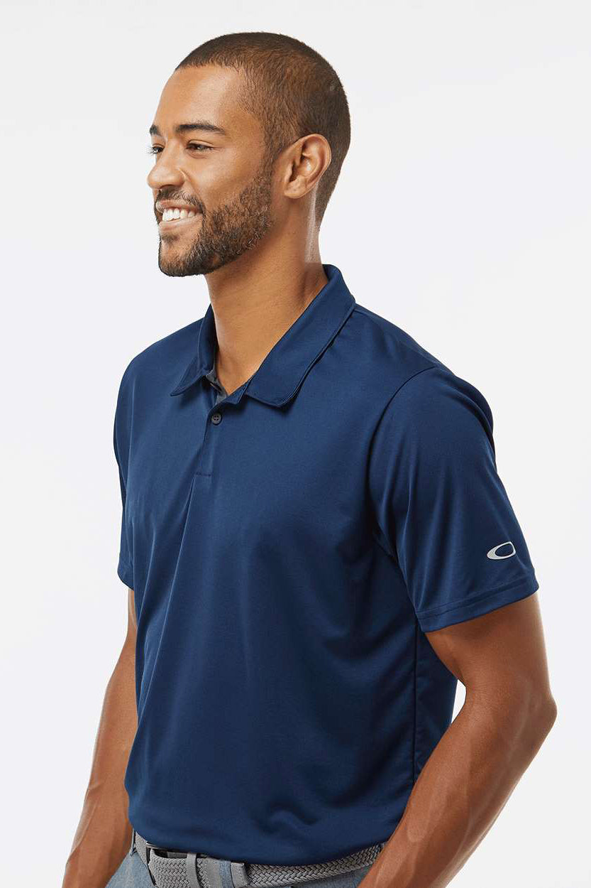 Oakley FOA402993 Mens Team Issue Hydrolix Short Sleeve Polo Shirt Team Navy Blue Model Side