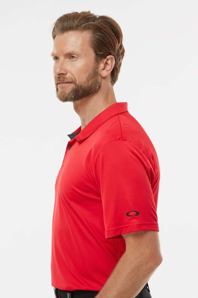 Oakley FOA402993 Mens Team Issue Hydrolix Short Sleeve Polo Shirt Team Red Model Side