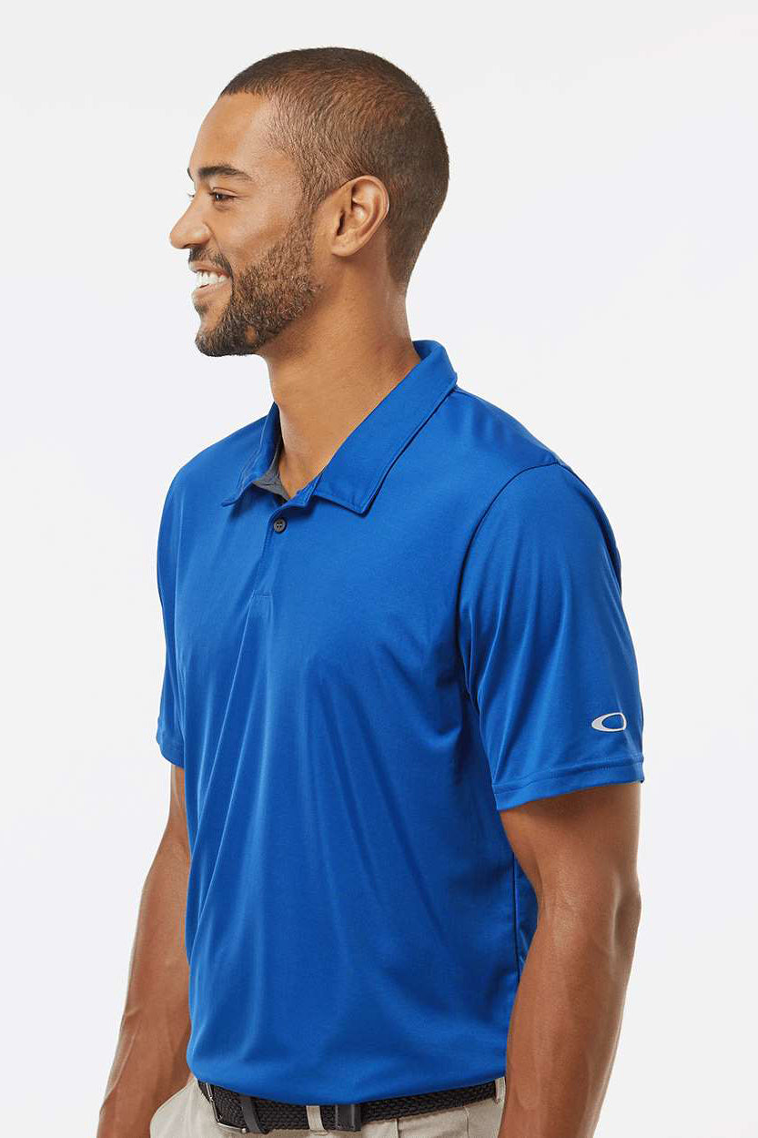 Oakley FOA402993 Mens Team Issue Hydrolix Short Sleeve Polo Shirt Team Royal Blue Model Side
