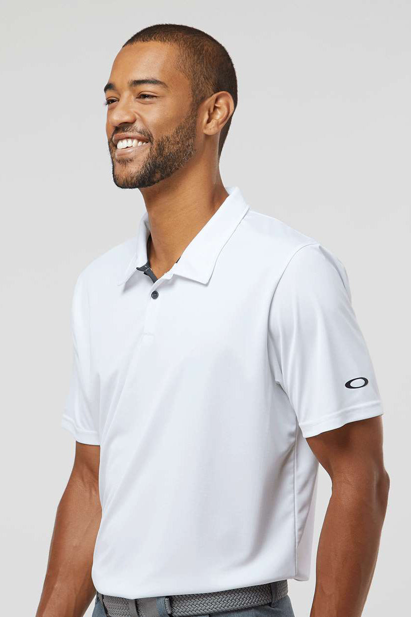Oakley FOA402993 Mens Team Issue Hydrolix Short Sleeve Polo Shirt White Model Side