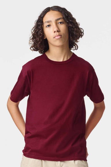 American Apparel 2001Y Youth Fine Jersey Short Sleeve Crewneck T-Shirt Cranberry Red Model Front