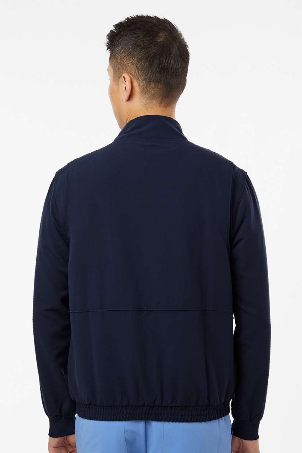 Jaanuu M60001 Unisex Wolfe Everyday 6 Pocket Full Zip Scrub Jacket Midnight Navy Blue Model Back