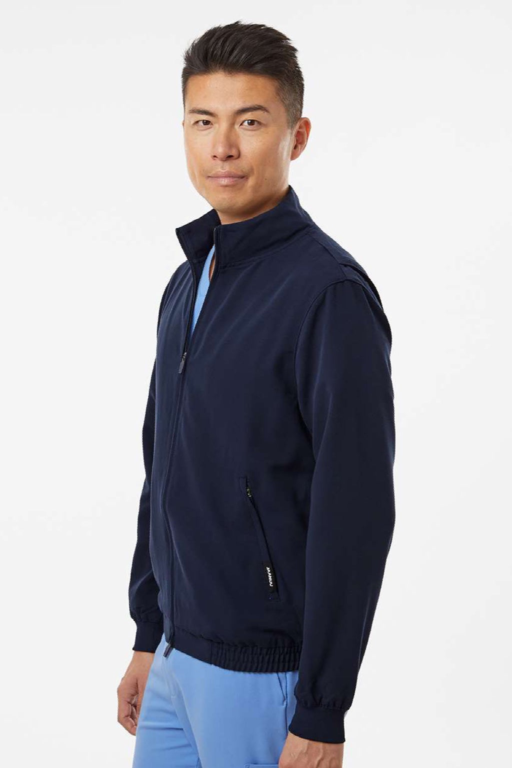 Jaanuu M60001 Unisex Wolfe Everyday 6 Pocket Full Zip Scrub Jacket Midnight Navy Blue Model Side