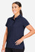 Devon & Jones DG110W Womens CrownLux Performance Windsor Welded Short Sleeve Polo Shirt Navy Blue Model Side