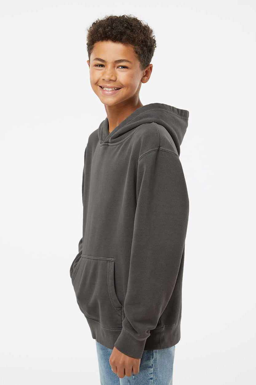 Independent Trading Company PRM1500Y Youth Pigment Dyed Hooded Sweatshirt Hoodie w/ Pouch Pocket Black Model Side