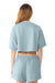 Bella + Canvas BC6882GD Womens Garment Dyed Cropped Short Sleeve Crewneck T-Shirt Light Washed Denim Blue Model Back