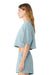 Bella + Canvas BC6882GD Womens Garment Dyed Cropped Short Sleeve Crewneck T-Shirt Light Washed Denim Blue Model Side