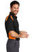 CornerStone CS416 Mens Select Moisture Wicking Short Sleeve Polo Shirt w/ Pocket Black/Shock Orange Model Side