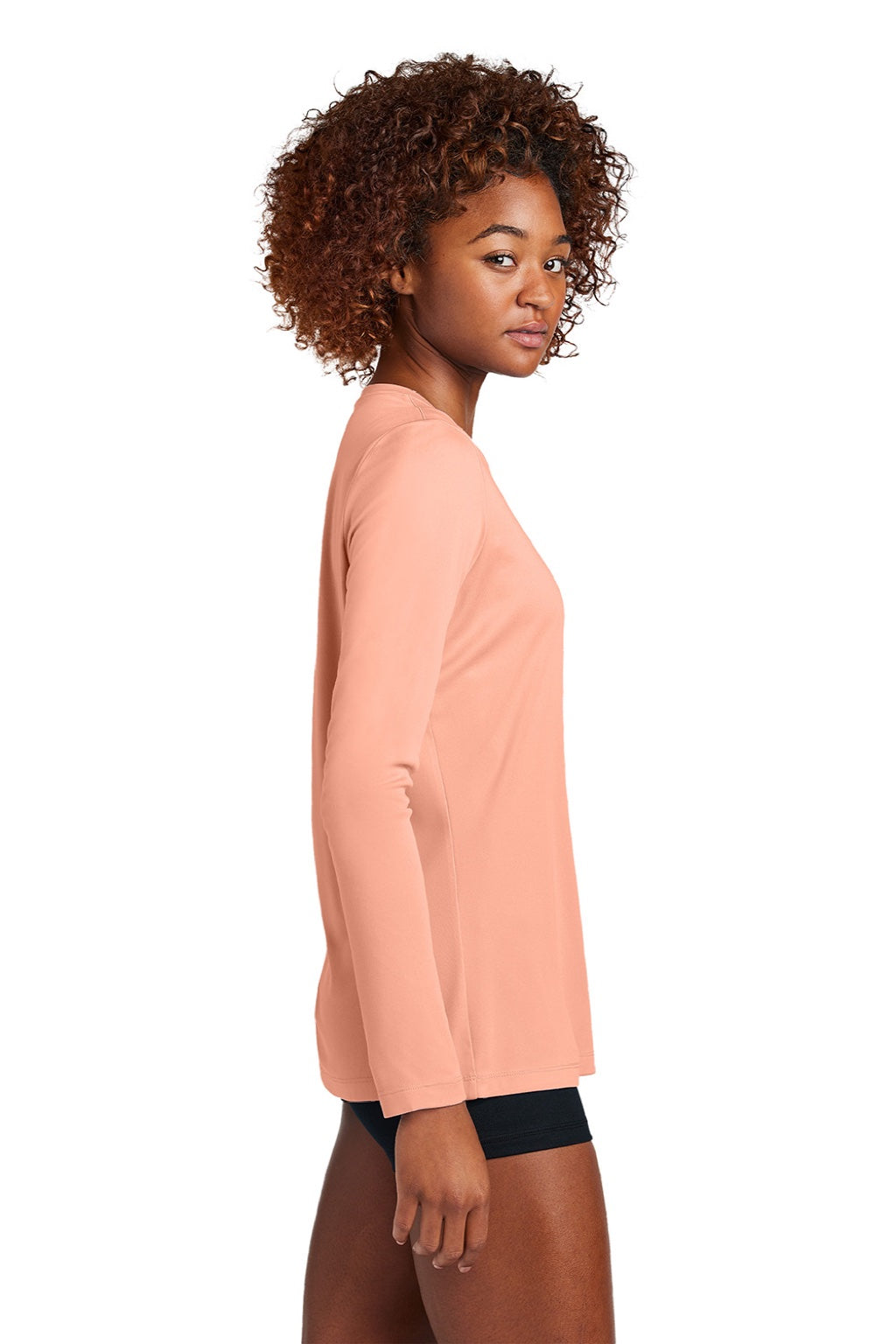 Sport-Tek LST420LS Womens Posi-UV Pro Moisture Wicking Long Sleeve Crewneck T-Shirt Soft Coral Model Side