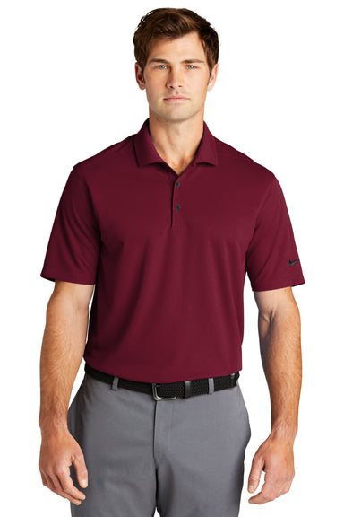 Nike NKDC1963 Mens Dri-Fit Moisture Wicking Micro Pique 2.0 Short Sleeve Polo Shirt Team Red Model Front