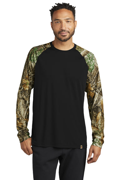 Russell Outdoors RU151LS Mens Realtree Colorblock Moisture Wicking Long Sleeve Crewneck T-Shirt Black/Realtree Edge Camo Model Front