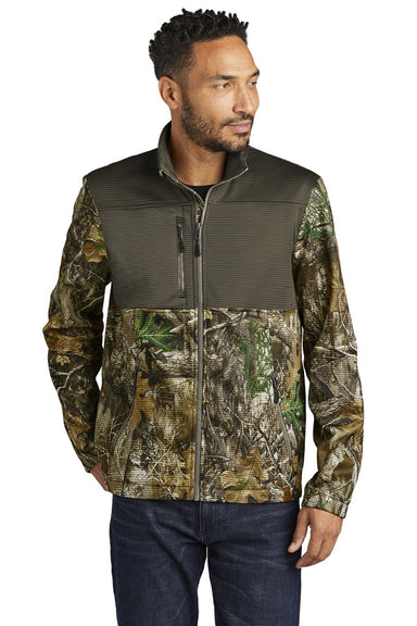 Russell Outdoors RU601 Mens Realtree Atlas Water Resistant Colorblock Full Zip Soft Shell Jacket Cargo Brown/Realtree Edge Camo Model Front