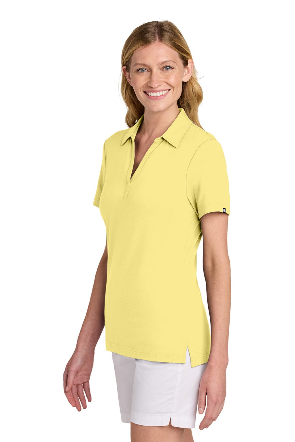 TravisMathew TM1LF071 Womens Glenview Wrinkle Resistant Short Sleeve Polo Shirt Pale Yellow Model Side