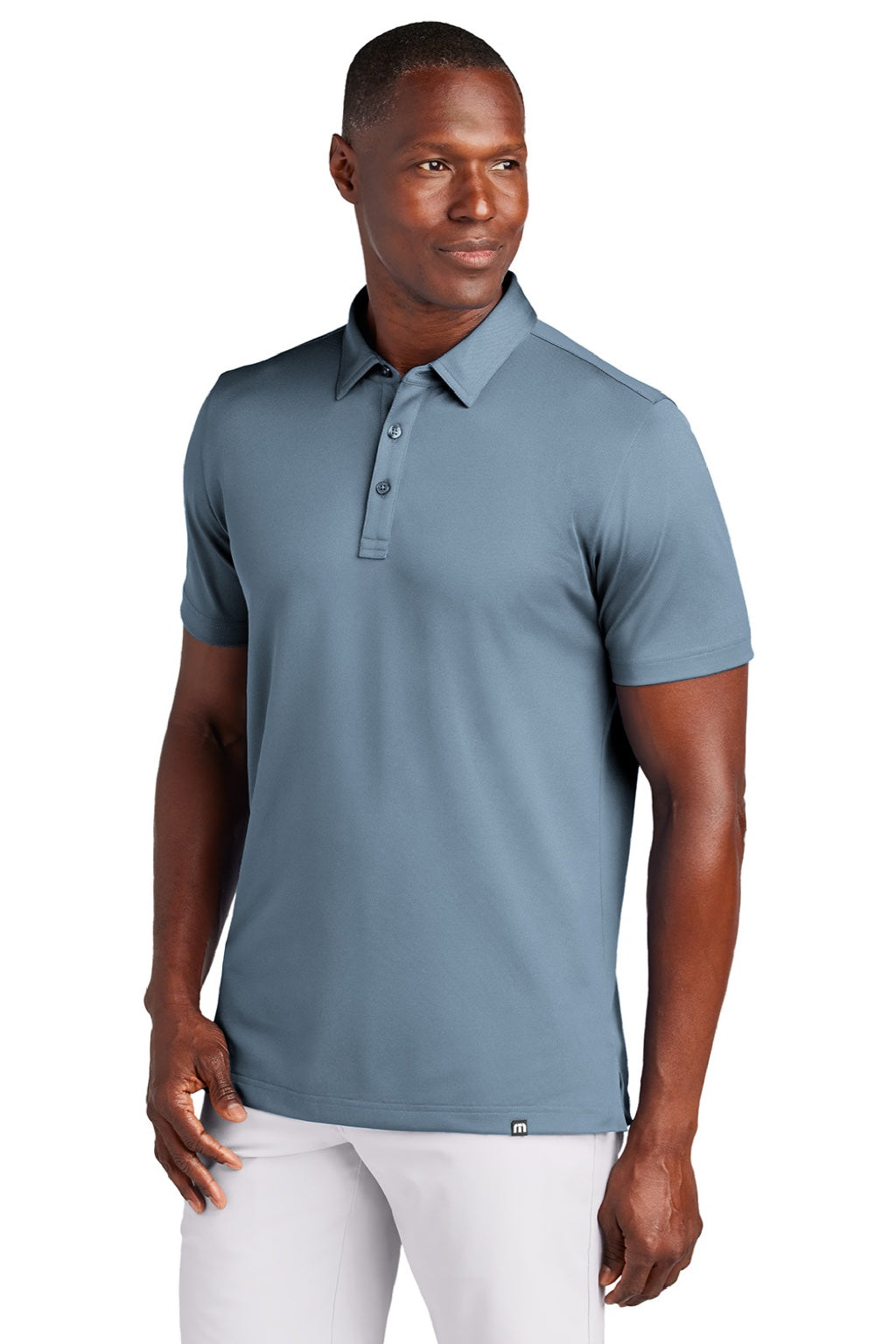 TravisMathew TM1MAA370 Mens Cabana Wrinkle Resistant Short Sleeve Polo Shirt Light Denim Blue Model Front