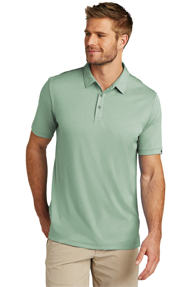 TravisMathew TM1MU410 Mens Coto Performance Moisture Wicking Short Sleeve Polo Shirt Heather Beryl Green Model Front