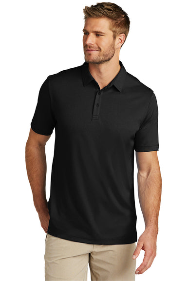 TravisMathew TM1MU410 Mens Coto Performance Moisture Wicking Short Sleeve Polo Shirt Black Model Front