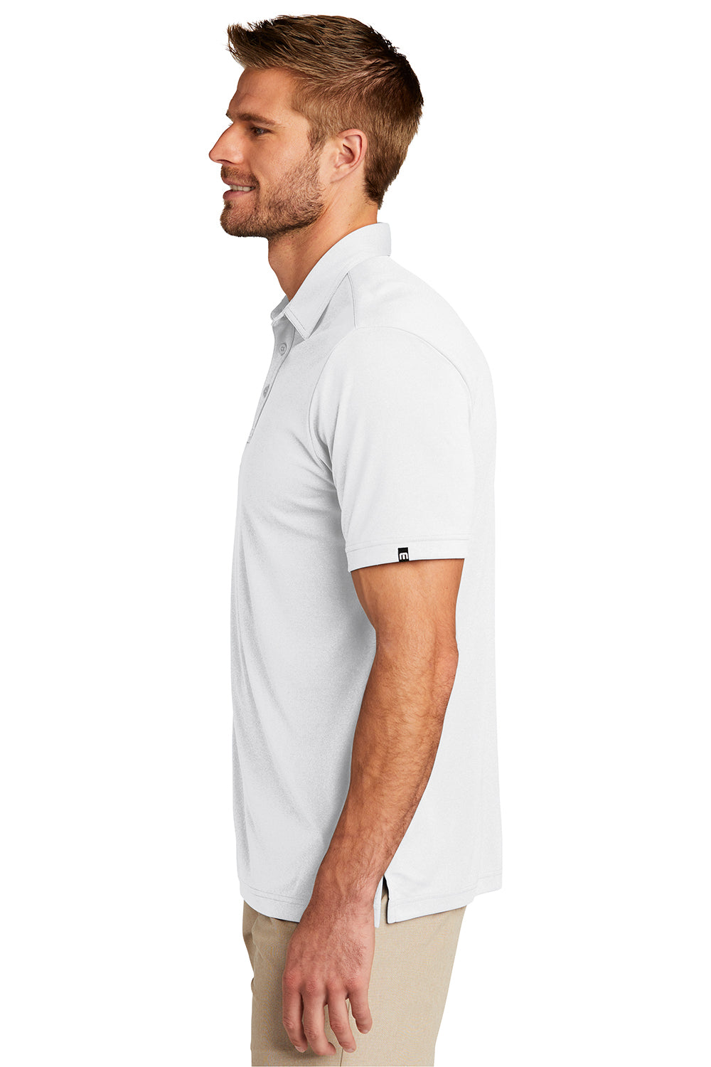 TravisMathew TM1MU410 Mens Coto Performance Moisture Wicking Short Sleeve Polo Shirt White Model Side