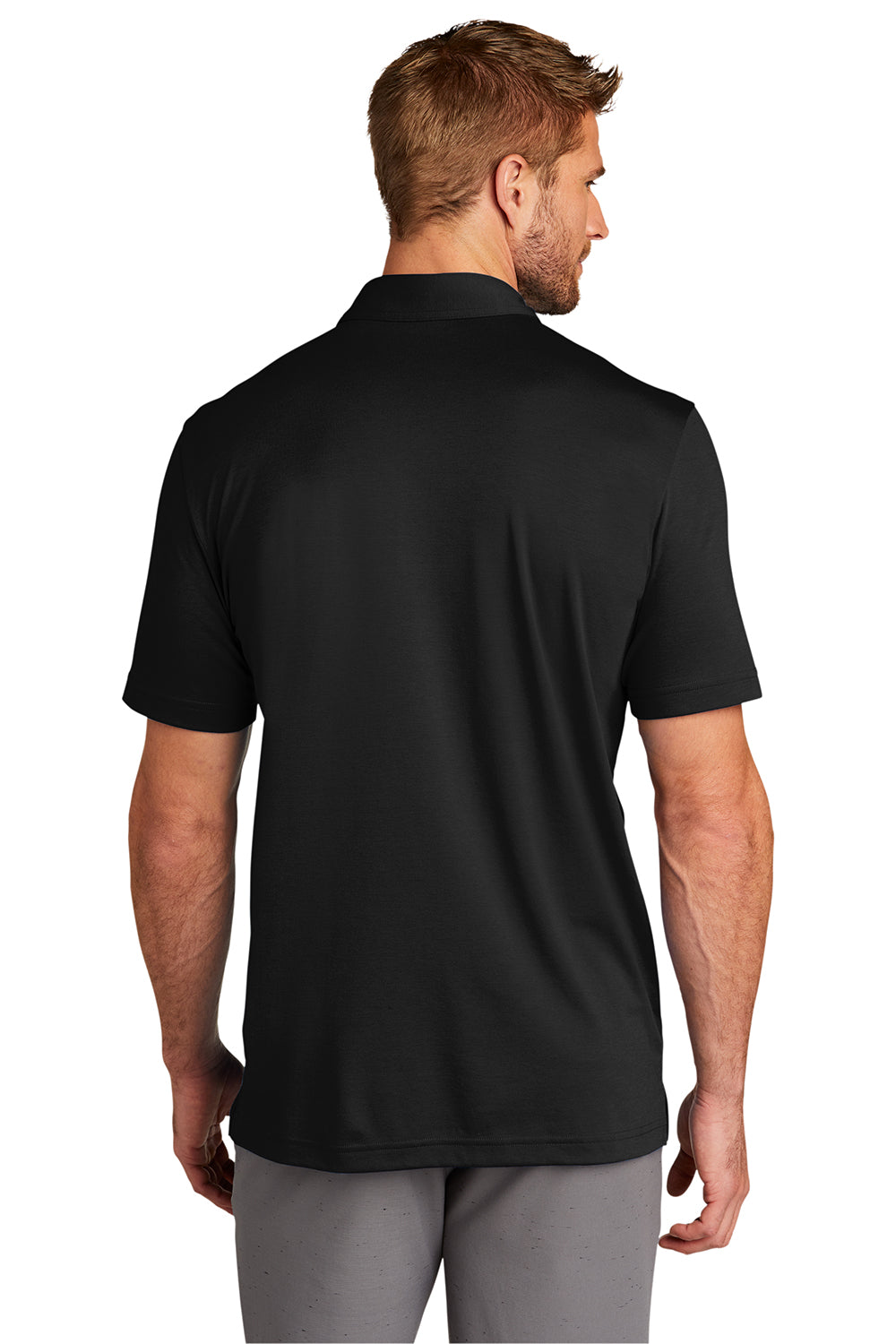 TravisMathew TM1MU411 Mens Oceanside Moisture Wicking Short Sleeve Polo Shirt Black Model Back