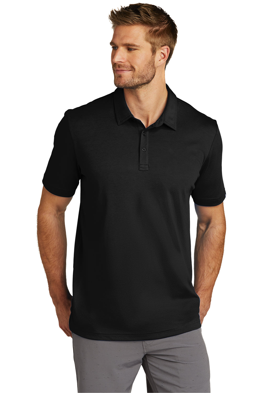 TravisMathew TM1MU411 Mens Oceanside Moisture Wicking Short Sleeve Polo Shirt Black Model Front