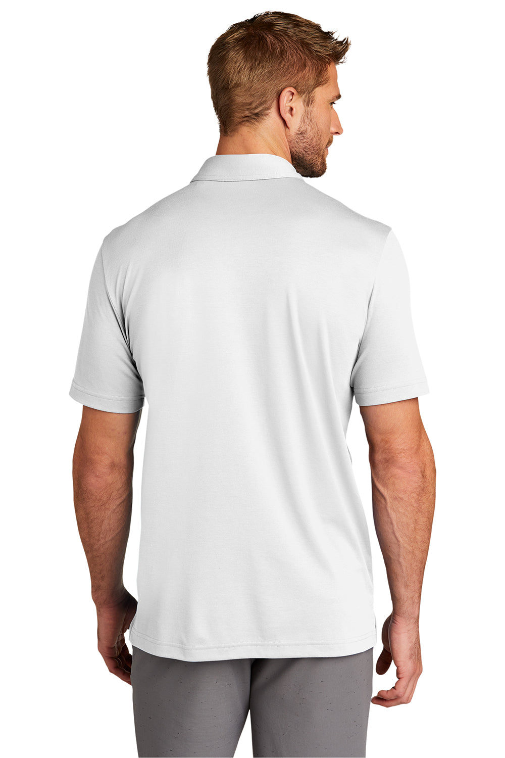 TravisMathew TM1MU411 Mens Oceanside Moisture Wicking Short Sleeve Polo Shirt White Model Back