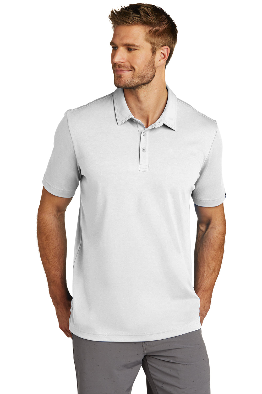 TravisMathew TM1MU411 Mens Oceanside Moisture Wicking Short Sleeve Polo Shirt White Model Front