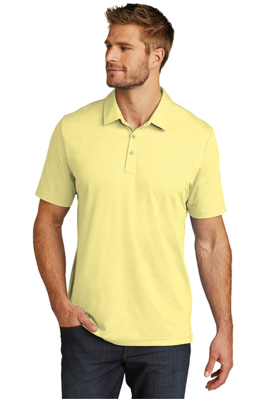 TravisMathew TM1MU412 Mens Oceanside Moisture Wicking Short Sleeve Polo Shirt Heather Pale Banana Yellow  Model Front