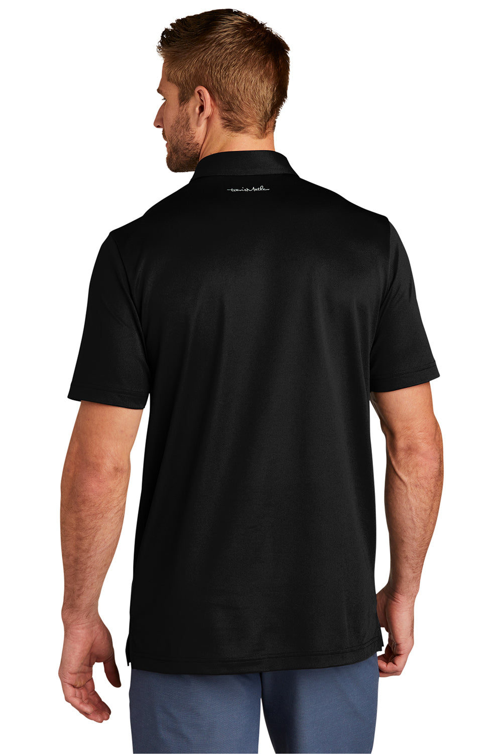 TravisMathew TM1MU416 Mens Cabana Moisture Wicking Short Sleeve Polo Shirt Black Model Back
