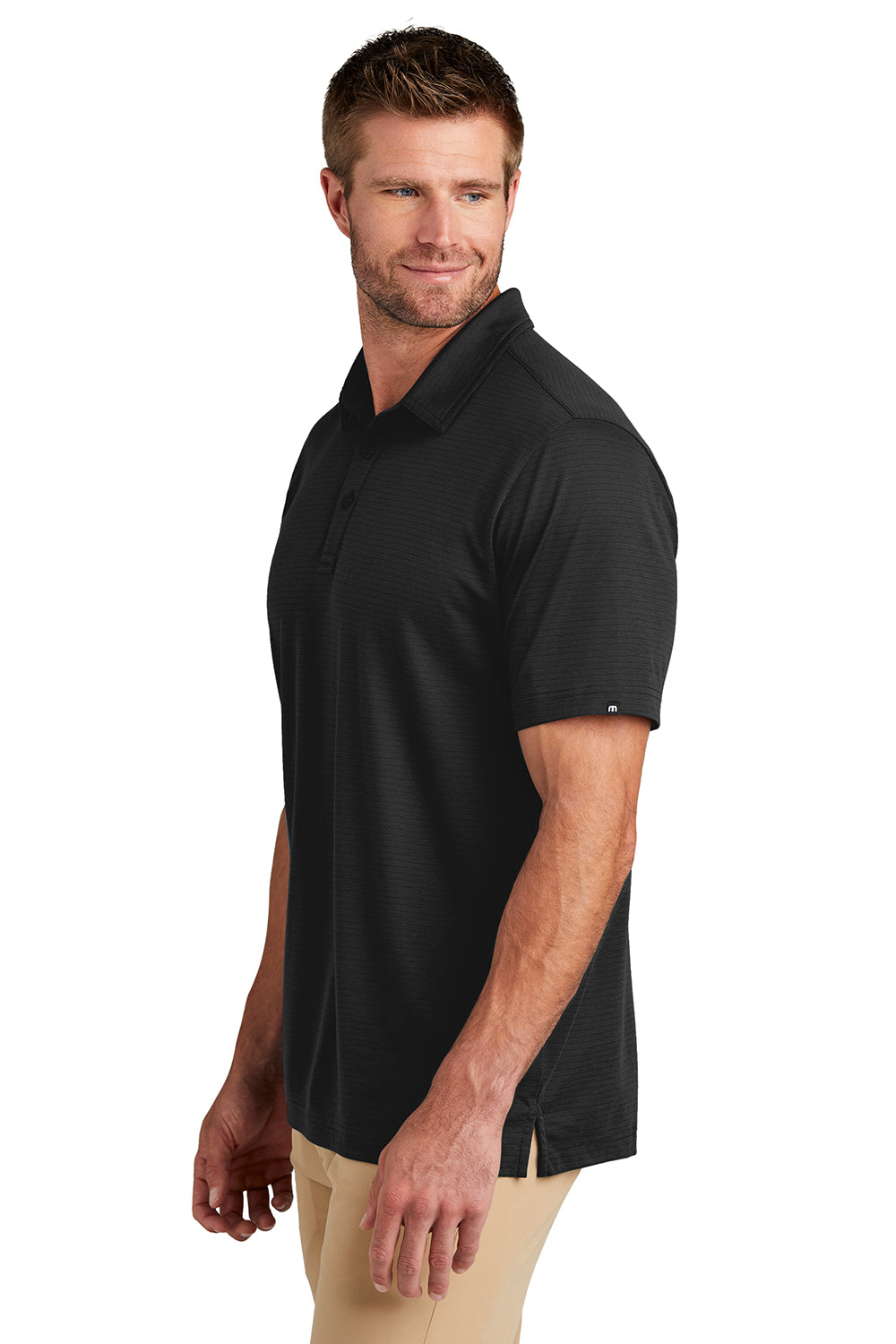 TravisMathew TM1MY399 Mens Bayfront Moisture Wicking Short Sleeve Polo Shirt Black Model Side