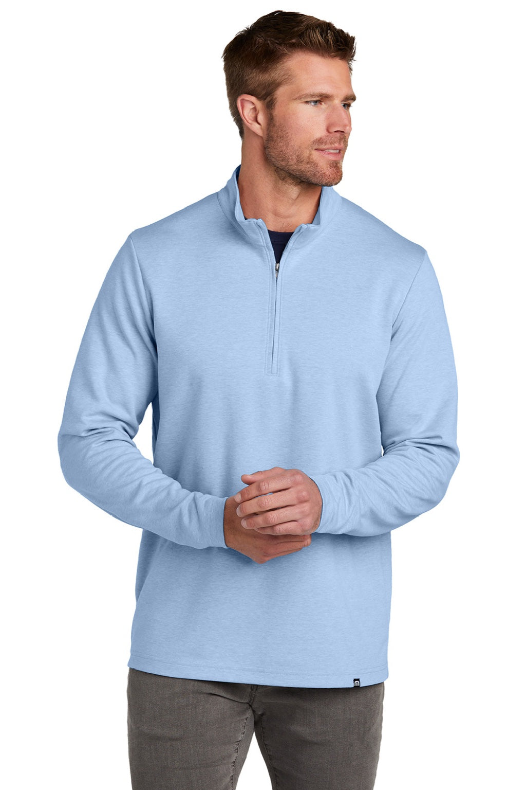 TravisMathew TM1MZ339 Mens Coveside Wrinkle Resistant 1/4 Zip Sweatshirt Heather Light Blue Model Front