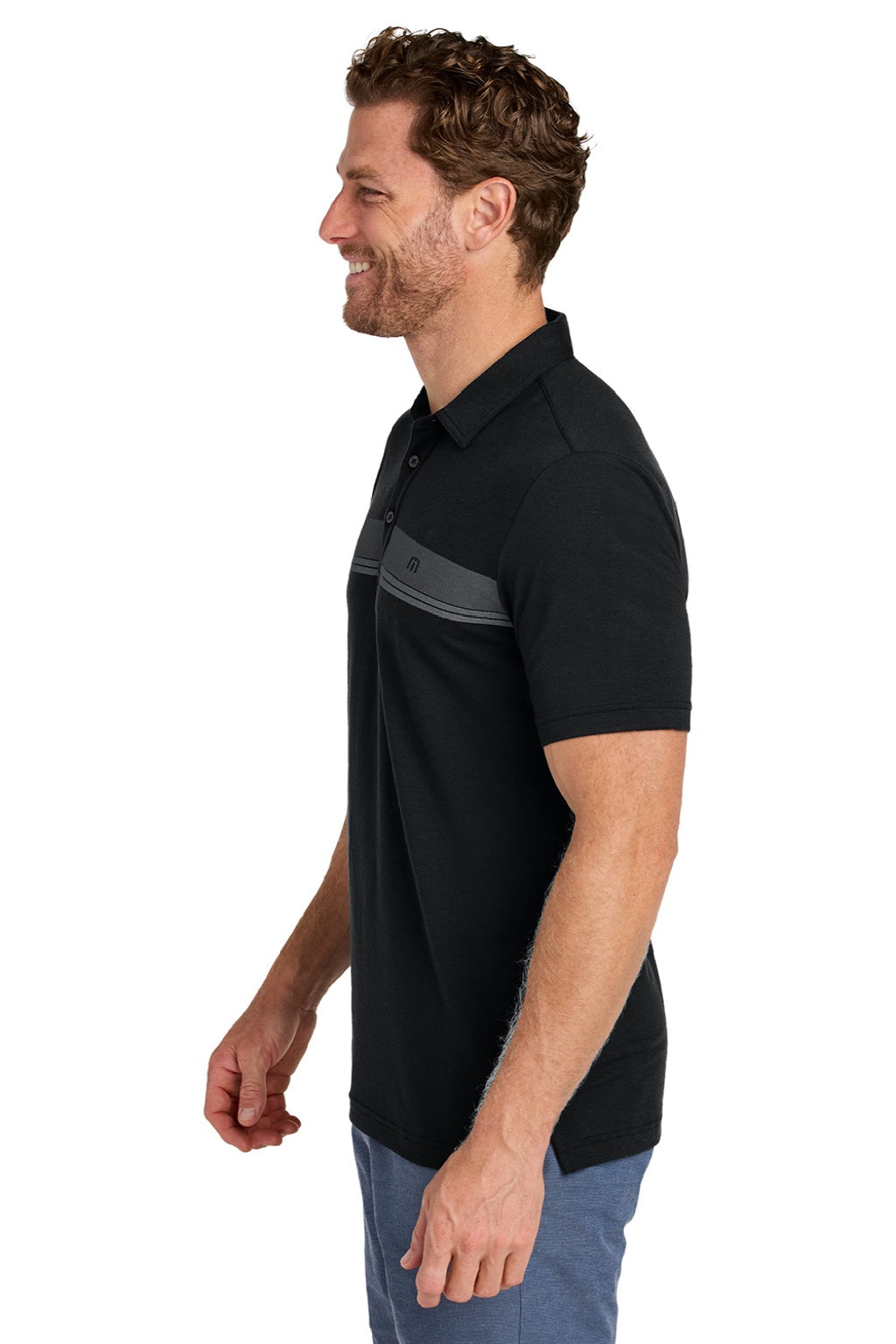 TravisMathew TMA41462 Mens Glenview Wrinkle Resistant Short Sleeve Polo Shirt Black Model Side