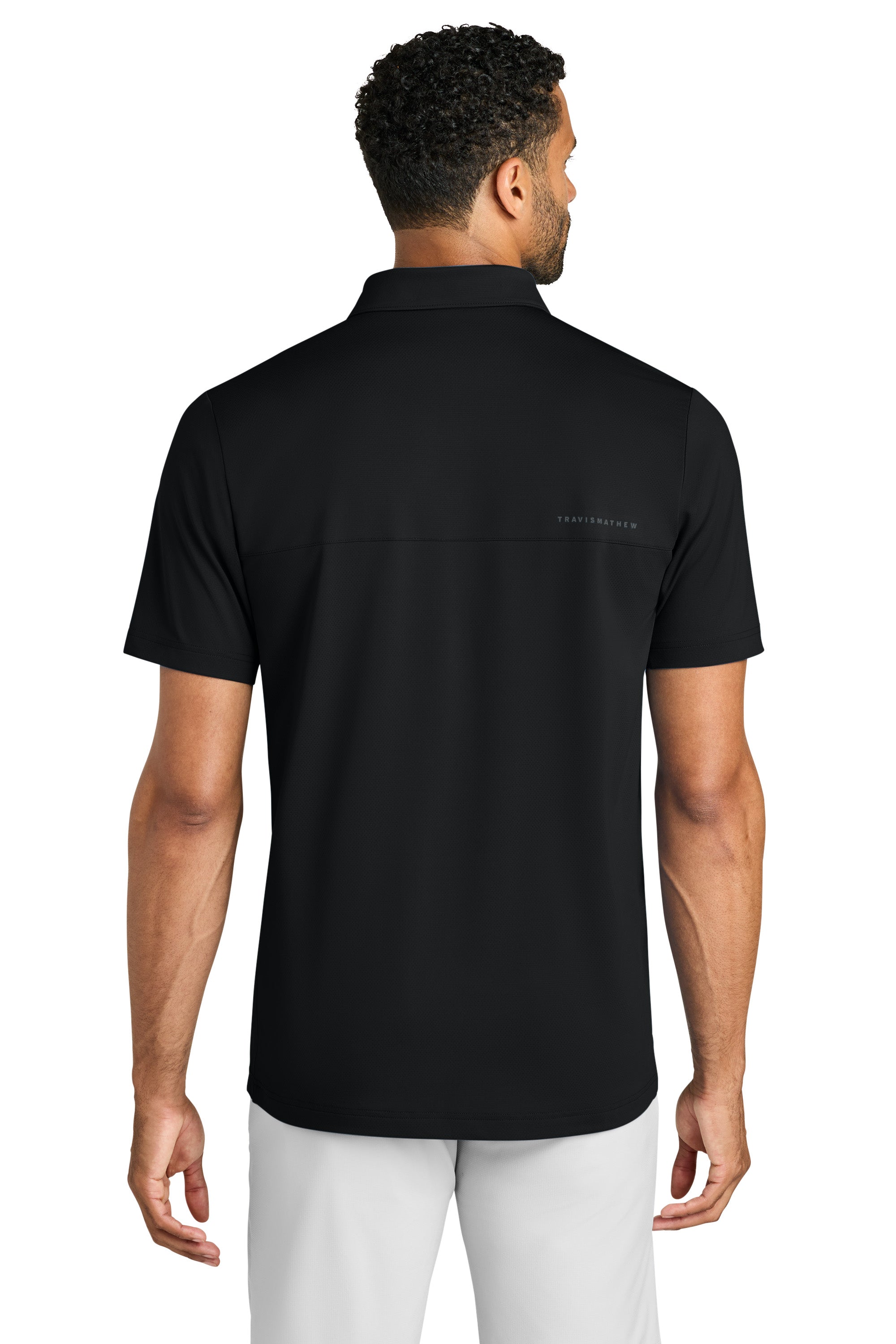 TravisMathew TMA42773 Mens Onward Short Sleeve Polo Shirt Black Model Back