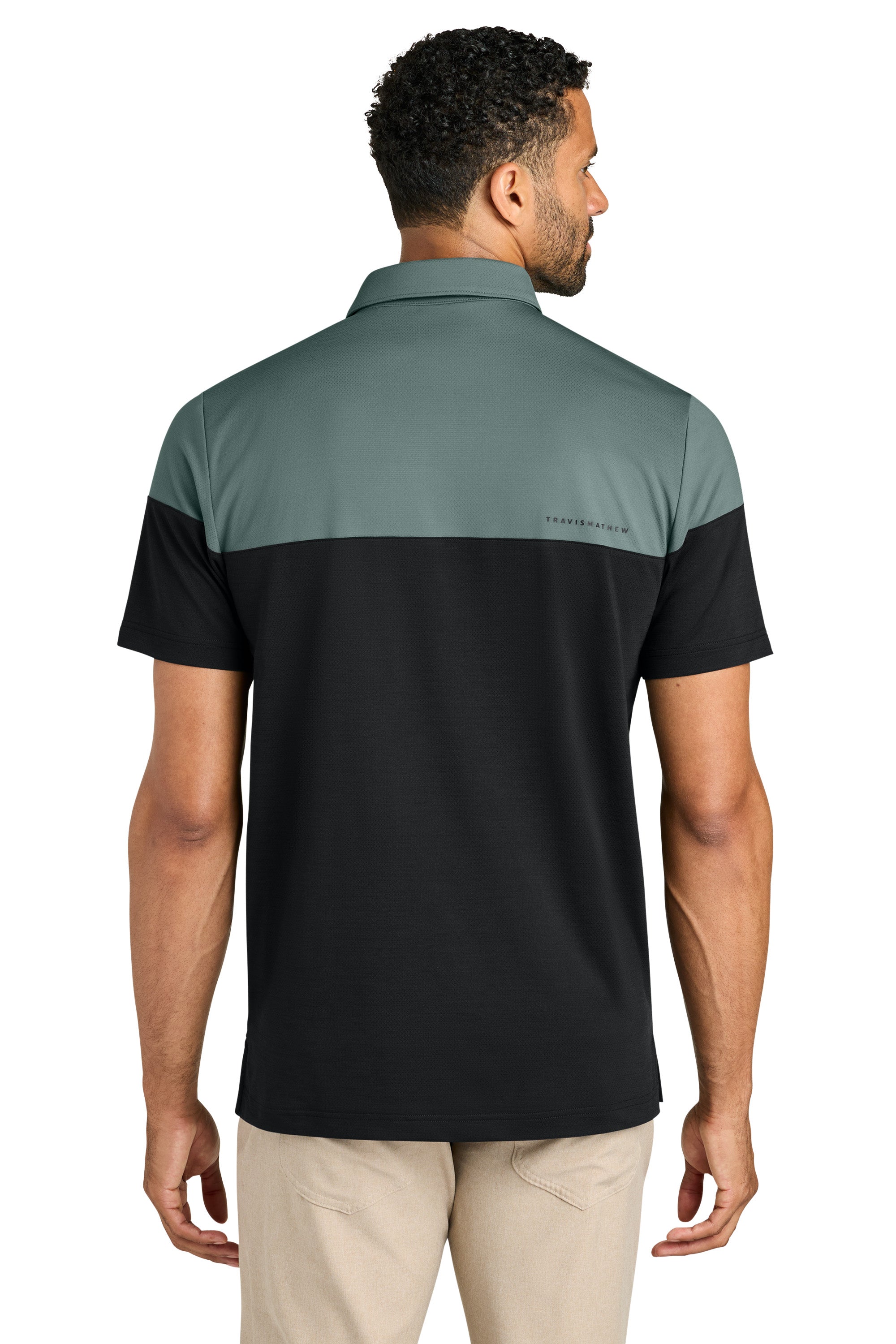 TravisMathew TMA42774 Mens Onward Colorblock Short Sleeve Polo Shirt Balsam Green/Black Model Back