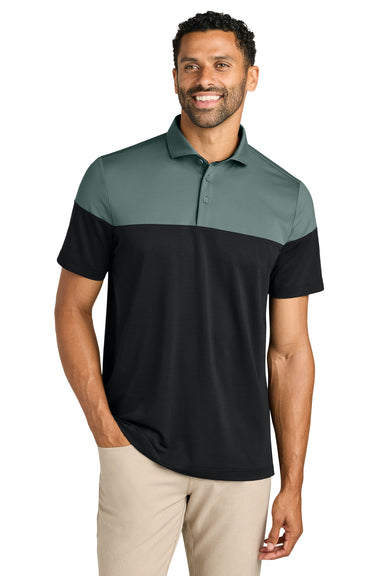 TravisMathew TMA42774 Mens Onward Colorblock Short Sleeve Polo Shirt Balsam Green/Black Model Front