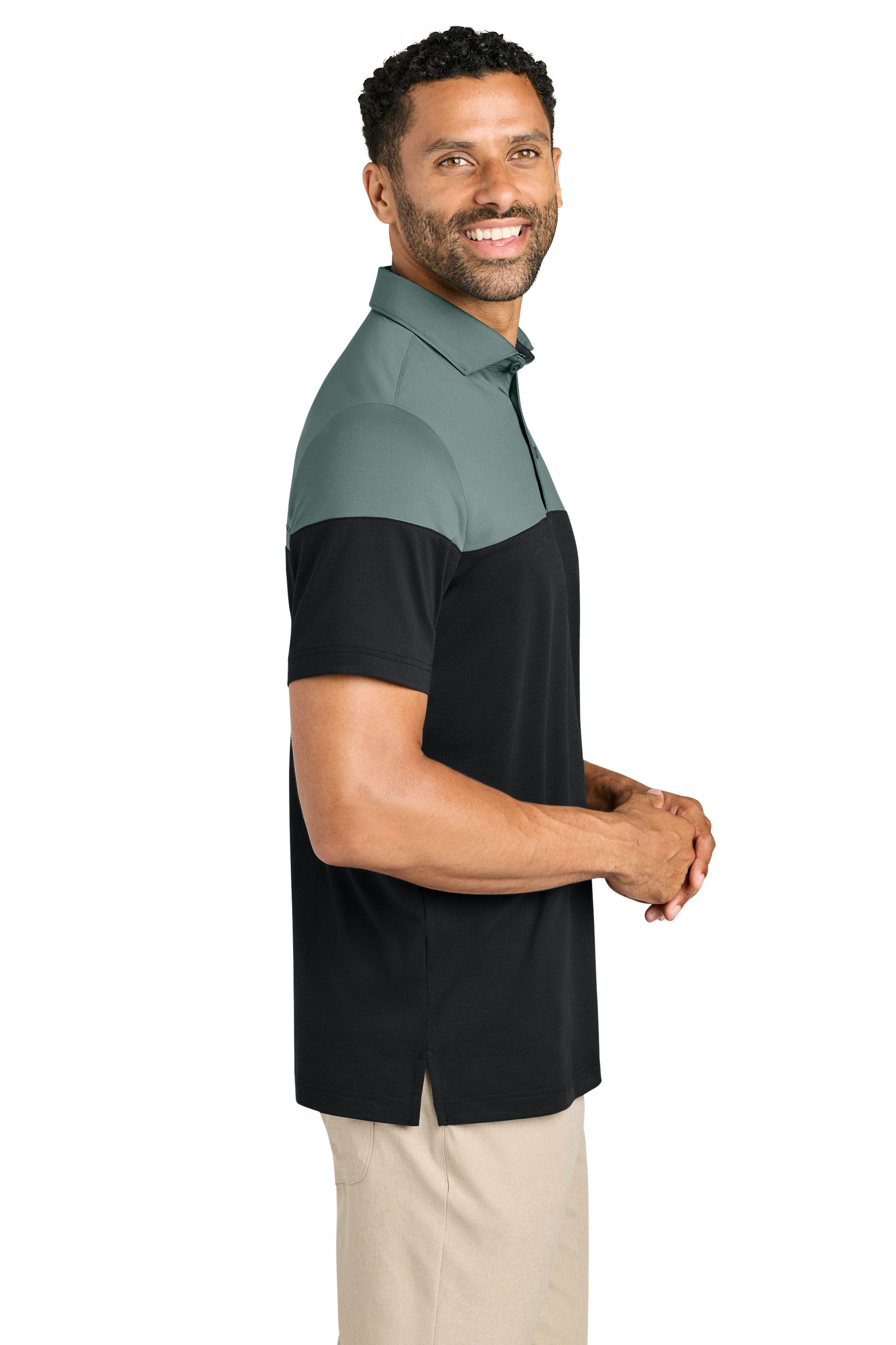 TravisMathew TMA42774 Mens Onward Colorblock Short Sleeve Polo Shirt Balsam Green/Black Model Side