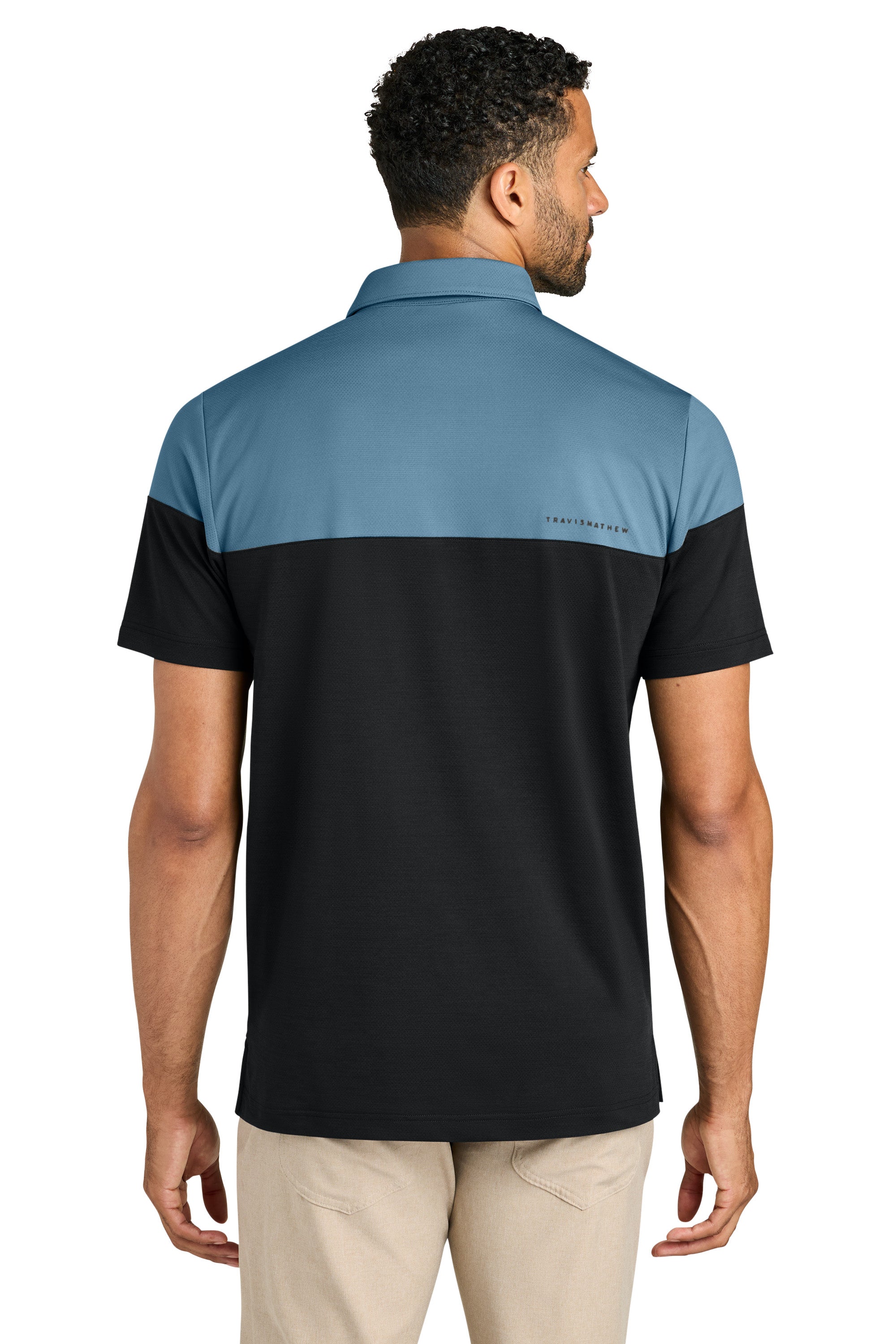 TravisMathew TMA42774 Mens Onward Colorblock Short Sleeve Polo Shirt Copen Blue/Black Model Back