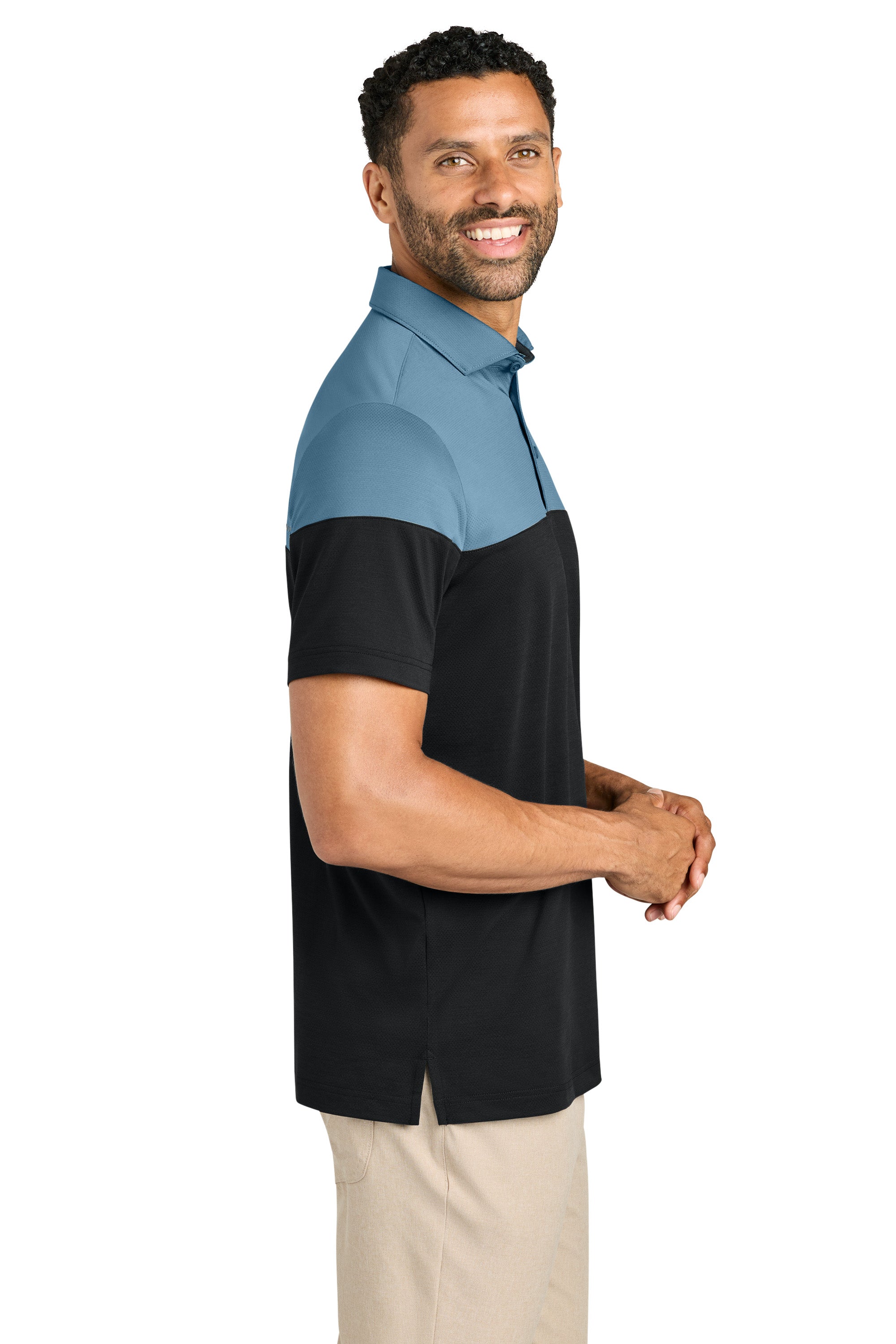 TravisMathew TMA42774 Mens Onward Colorblock Short Sleeve Polo Shirt Copen Blue/Black Model Side