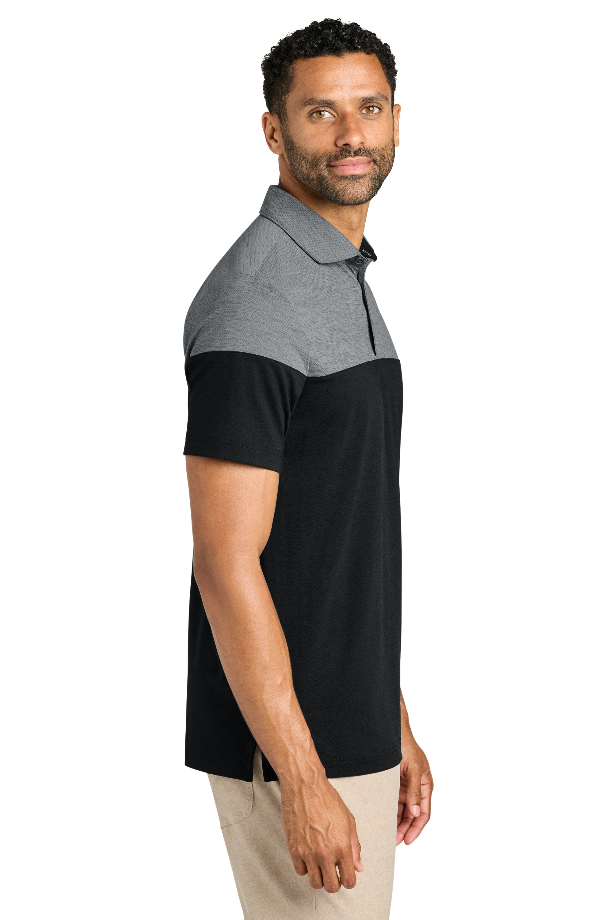 TravisMathew TMA42774 Mens Onward Colorblock Short Sleeve Polo Shirt Heather Quiet Shade Grey/Black Model Side
