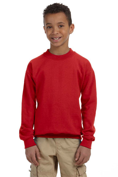 Gildan 18000B Youth Pill Resistant Fleece Crewneck Sweatshirt Red Model Front